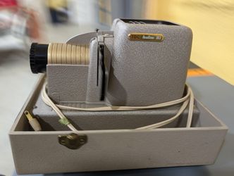 Bell& Howell / TDC HEADLINER 303 Slide Projector Is