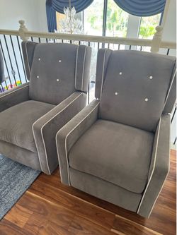Pair of gray swivel recliners - Excellent Condition - Retail $1650