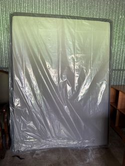 Box Spring Still in Plastic Wrap