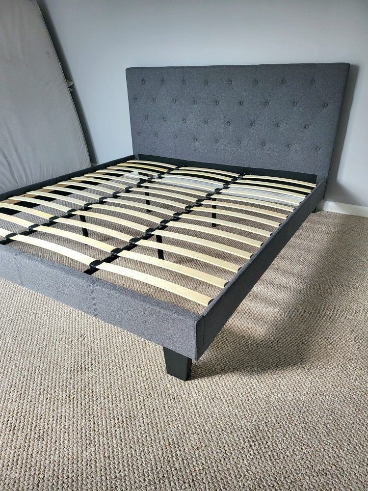 NEW KING UPHOLSTERED BED FRAME. Mattress sold separately
