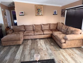 Sectional couch brown like new, is too big for our living room