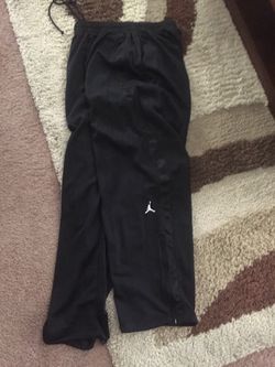 Nike!! black Air Jordan track pants. You need them. I don’t. Come get it