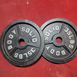 BODY SOLID. 2" HOLE  OLYMPIC PLATES 70LBs.     2-35s  
11525 S HALSTED DUNKIN DONUTS/7111.S WESTERN WALGREENS 
70$  CASH ONLY AS IS 