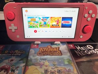 Nintendo Switch Lite with 3 games