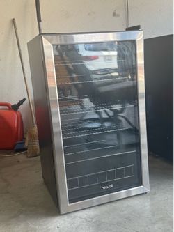 NewAir glass-door beverage refrigerator