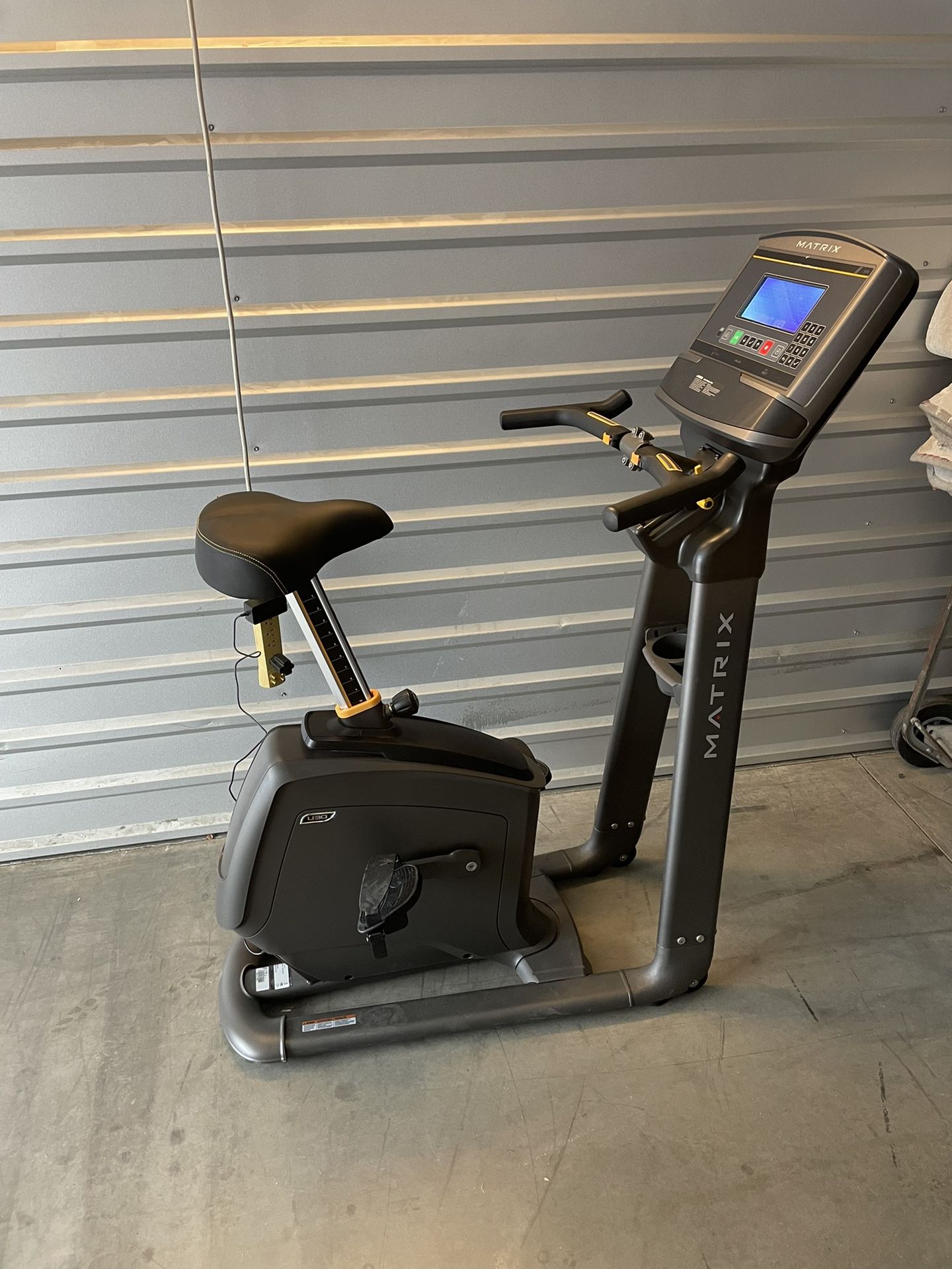 Like new Matrix Upright exercise bike with Blue LCD Console