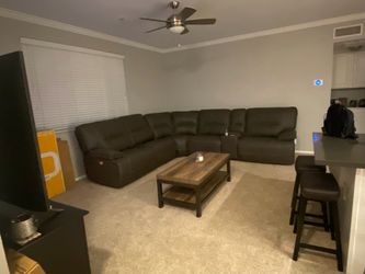 Sectional recliner w/ console