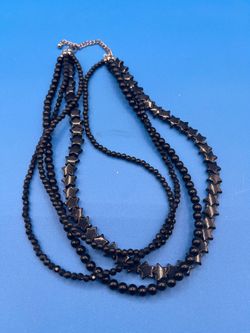 Black multi strand beaded necklace