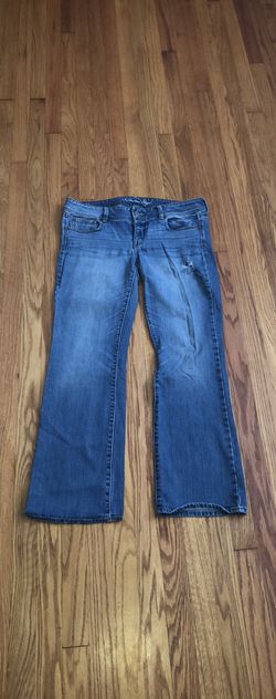 American Eagle 🦅 size 14 stretchy SLIM BOOT jeans with a few rips