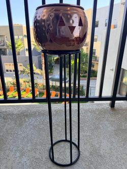 Hammered metal pumpkin stand