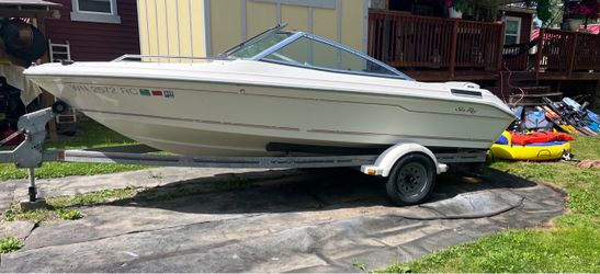 1993 Sea Ray 16’ fiberglass boat.