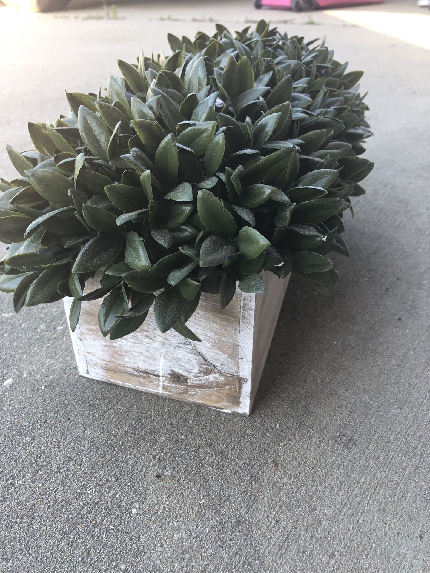 Rustic planter with fake plant