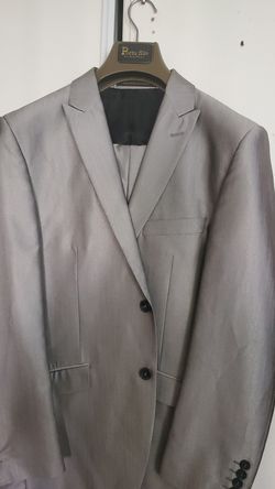 Traje de hombre π