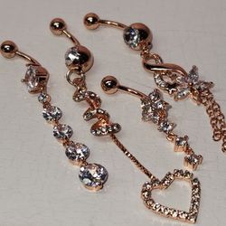 #2311, LOT ROSE GOLD SURGICAL STEEL  BELLY BAR , LIKE NEW 4