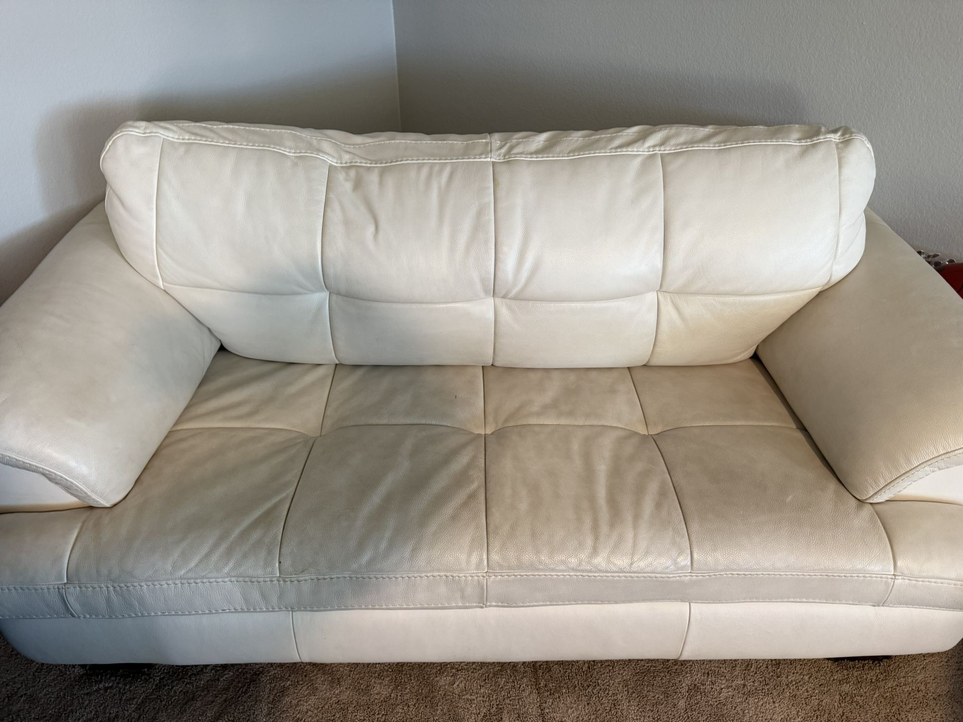 Ashleys Leather White Couches