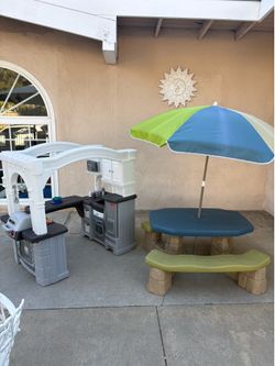 Step 2 kitchen and picnic table. (Toy food included)