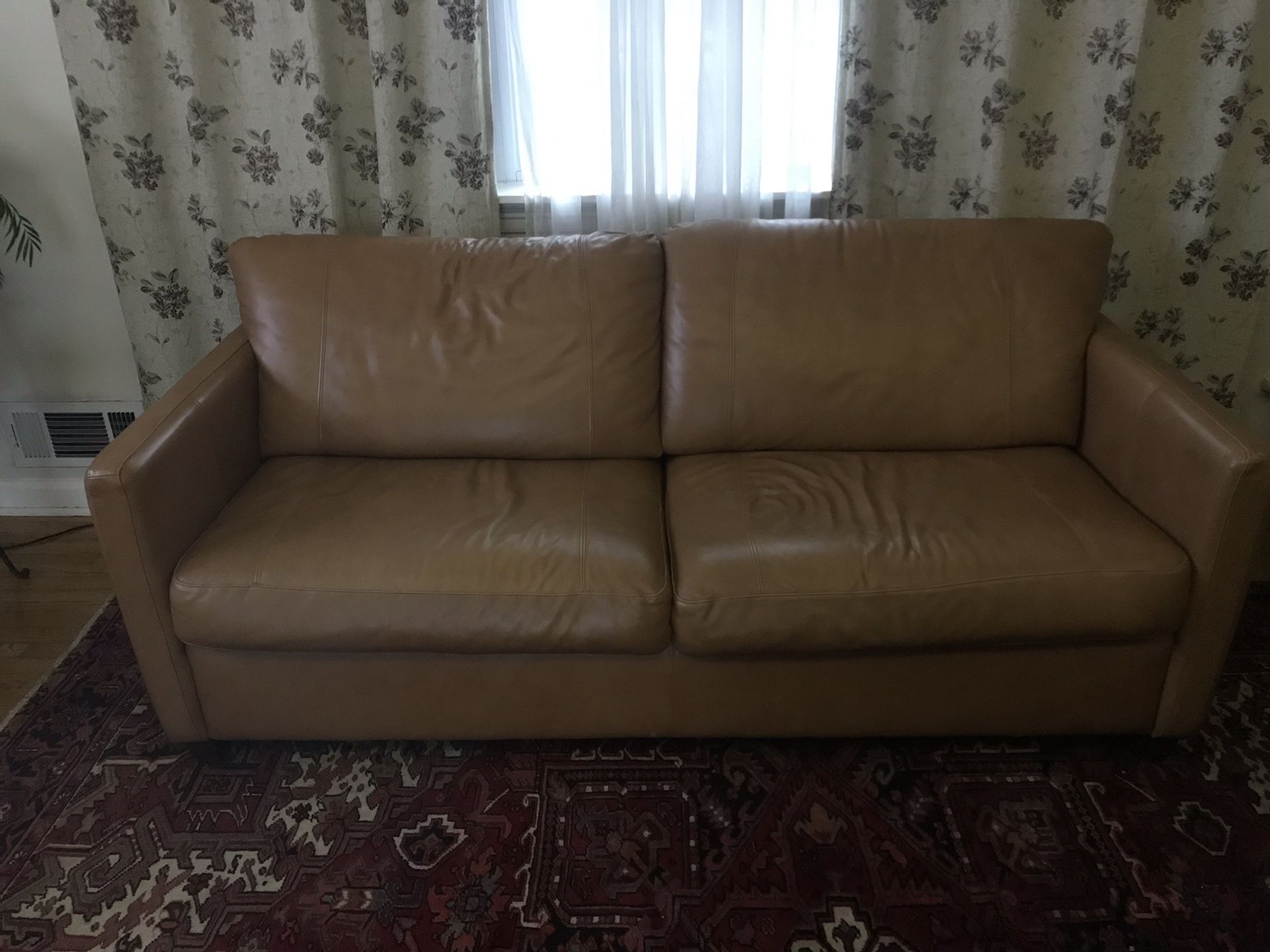 Real leather sofa bed.