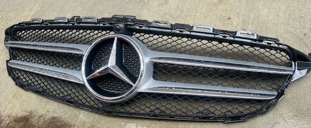 Genuine OEM Mercedes-Benz front grille removed from a 2017 Mercedes-Benz C300.