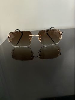 Cartier Rimless Brown Sunglasses