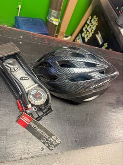 Foot pump with gauge and bicycle helmet / both $15