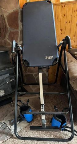 Inversion table with gravity boots