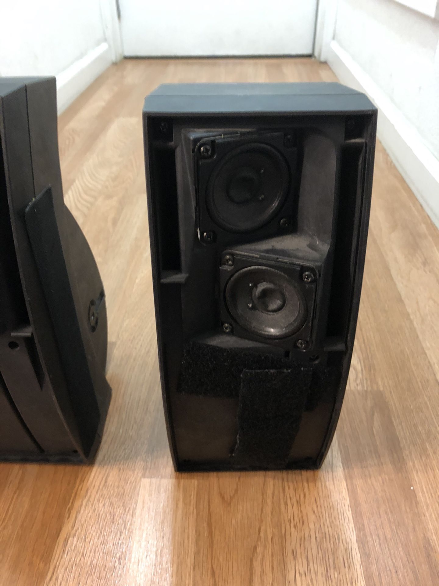 Bose 302 A environmental speaker cover is missing but works great