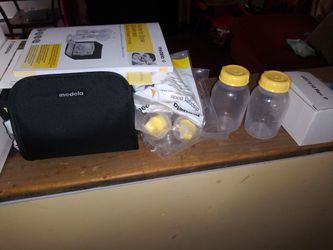 Medelo breast pump/ brand new