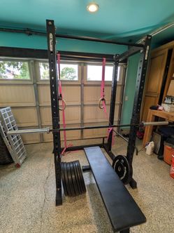 Squat Rack, bench, bar and weights