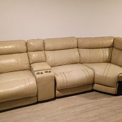 Selling Beige Leather Sectional With Cupholders for $300.