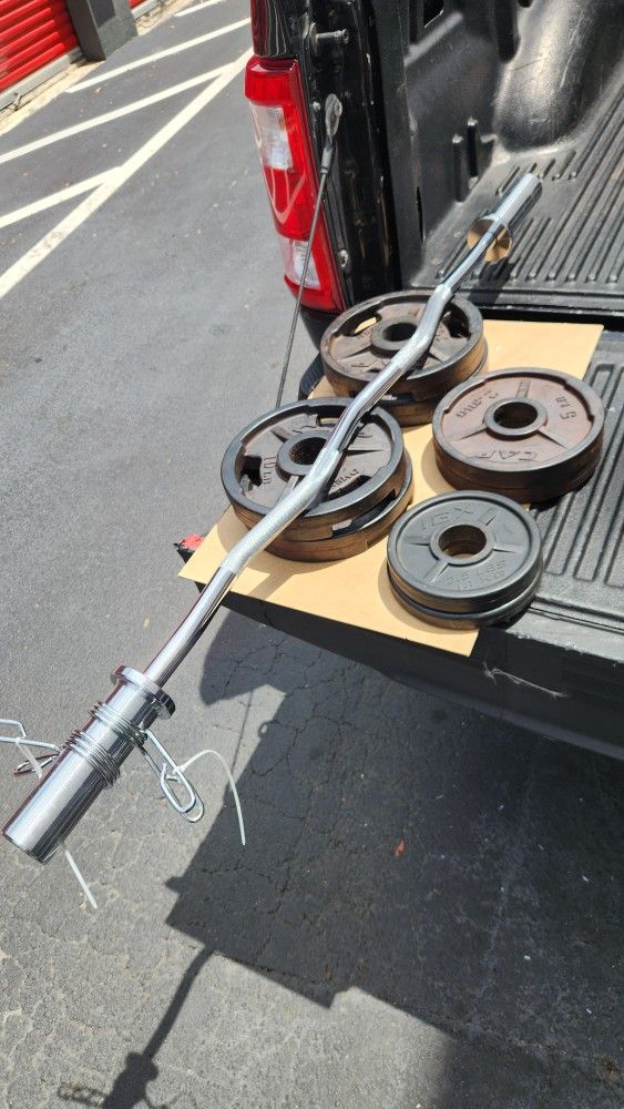 New Bar X curl Bar + Used 50 Pounds IGX Rubber Coated Weights+ New Pair Collars
Delivery for extra