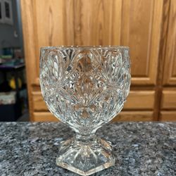 Vintage Clear Footed Glass Goblet.  Size approximately 6 inches tall.  Brand new never used.  Has been on display in a cabinet.  Smoke free home 