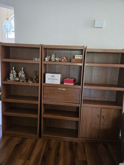 3 wood bookcases