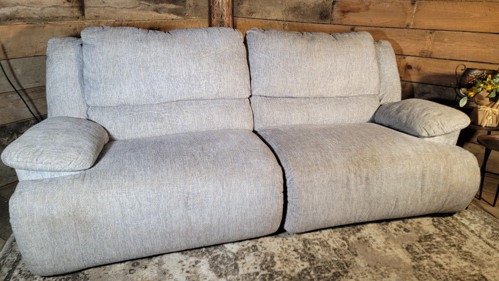 Ashley Furniture electric reclining sofa light grey