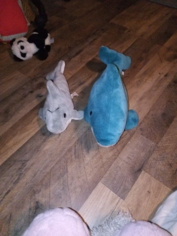 Two Stuffed Animal Dolphins