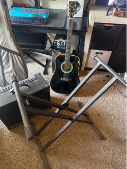 Guitar , stand and amplifier