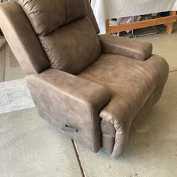 Almost new top quality rocker/swivel recliner