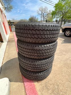 LT275/65/R20 Bridgestone dueler all-terrain 10 ply load range E Chevy Gmc Ford Rims