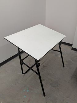 Folding drafting table