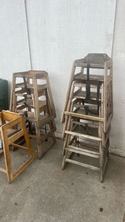 Hi chairs and a chair outside Coppa Woodworking in San Pedro free