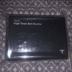 Tesla Texas Opening Commemorative Giga Belt Buckle with receipt showing Purchasesd with Dogecoin 