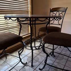 tall breakfast table with 3 chairs