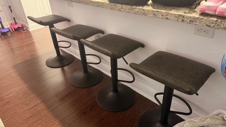 4 gray and black counter stools