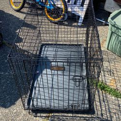 Pet Crate 2 Gate  Size 36 Length Width Height 24. Price 35$. Pick Up E.  Side Tacoma 
