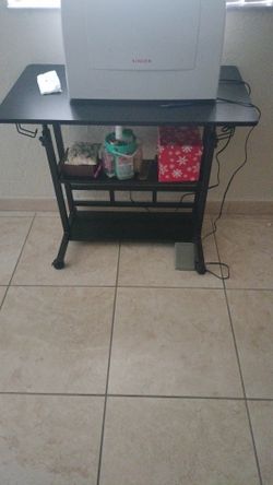 Compact black sewing machine