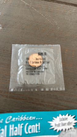 Uncirculated 1958 British coin 1/2 cent