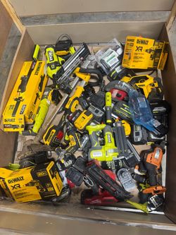 Pallet of tools and batteries for parts or repair