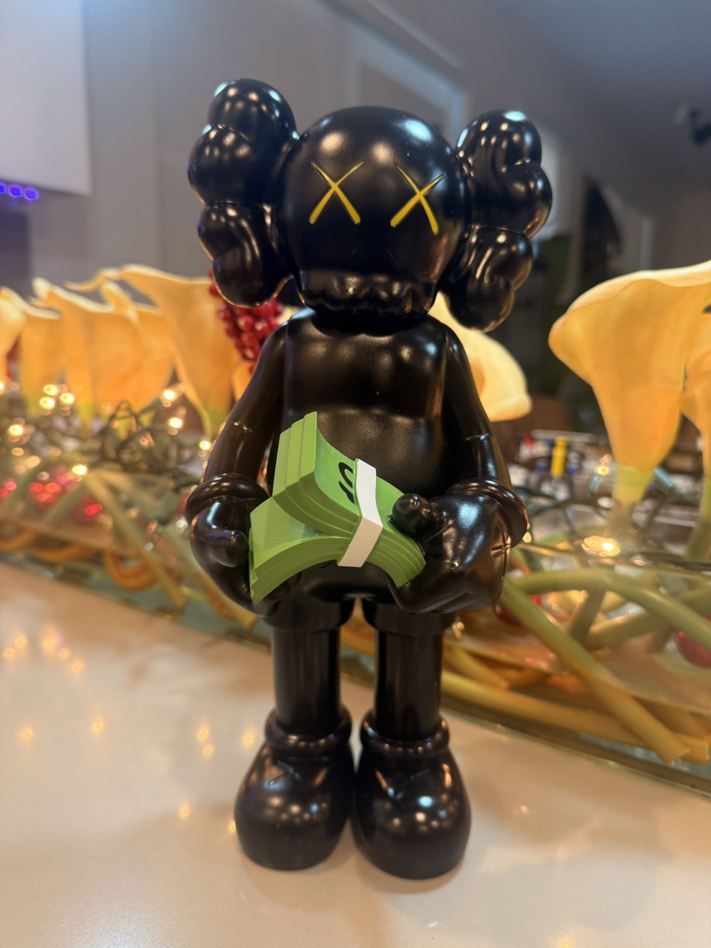 CASH kaws