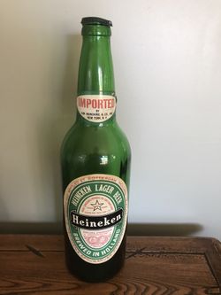 Vintage empty 18” Heineken bottle
