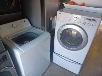 Lg Top load Washer and gas dryer