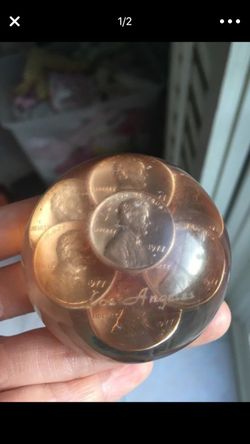 Old pennies paperweight